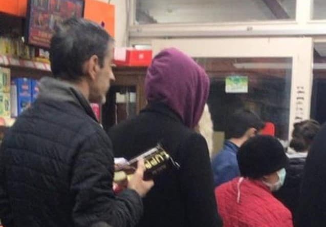 Citizens waiting in a queue in a market and breaking social-distancing precautions on the night of 10 April, just before the first curfew that was declared with only two hours’ notice